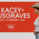 Promotional poster for Kacey Musgraves' Middle of Nowhere tour with a woman in a cowboy hat on an orange background.