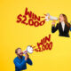 Bright yellow ad featuring three people with megaphones shouting 'WIN $2,000' for a prize promotion (advertising banner).
