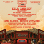 Poster for RedWest music festival with lineup and a Western town illustration and sunset in orange tones.