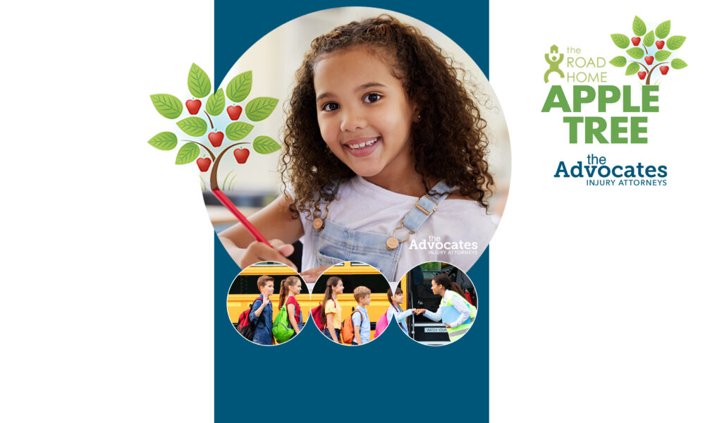 Young girl smiles while drawing with a pencil, with 'The Road Home Apple Tree' branding on the right and teal background behind her.